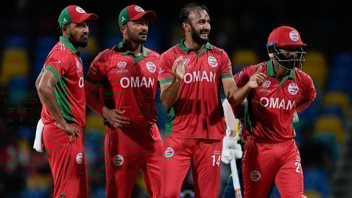 Ricardo Mazalan/AP : Oman Cricket Team Celebrating A Wicket 